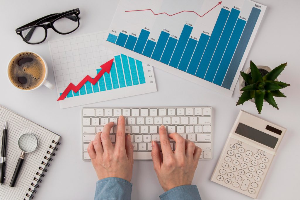 Using a laptop to monitor organic website traffic statistics